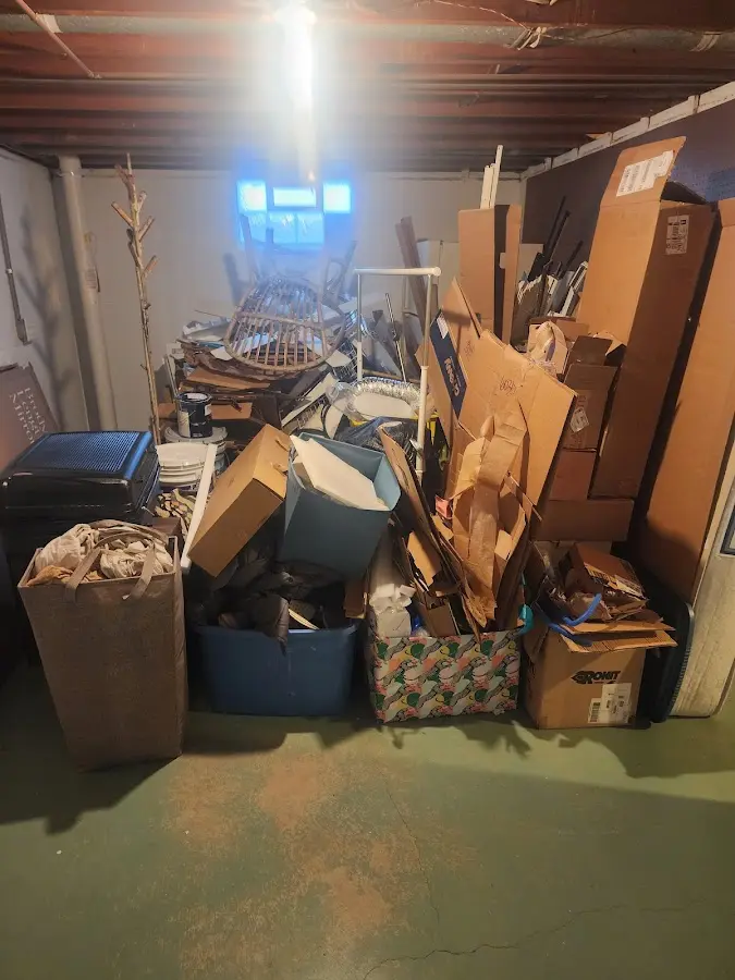 Roll-off dumpster container at job site for Roll Off Dumpster Rental in Chelsea